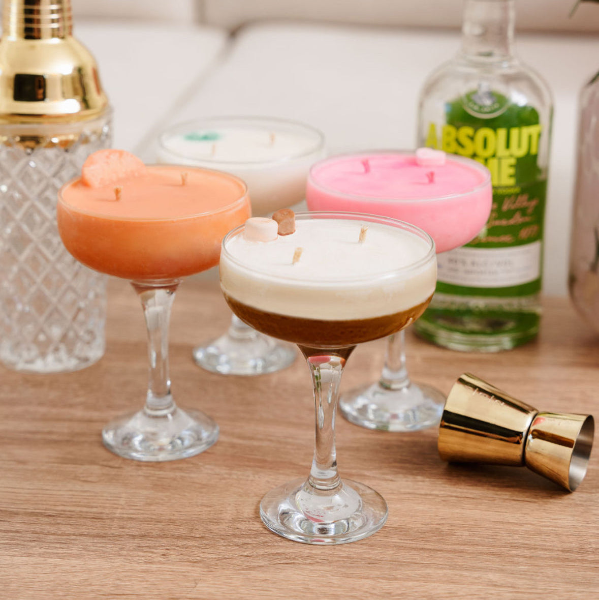 4 LoveTay Candles Cocktail Candles being the Espresso Martini Candle at the front, Sex on the Beach Candle on the left, LoveTay Cocktail Candle on the right hand side and the Mint Mojito Cocktail candle at the back. 
