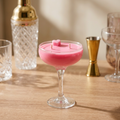 LoveTay Cocktail Candle with props in the background