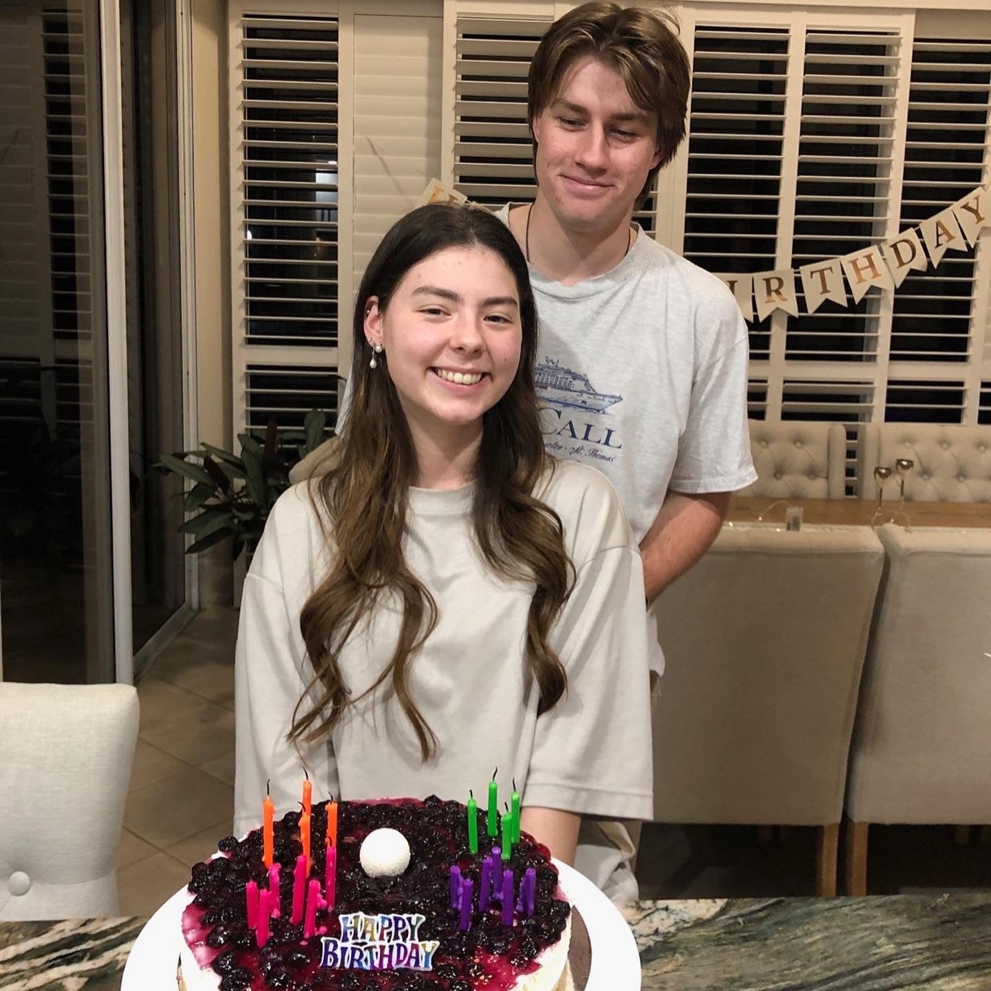 Picture of Taylah (owner of LoveTay Candles) and her fiancé with her birthday cake